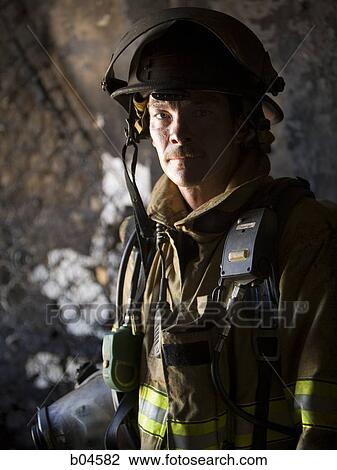 Fire fighter in uniform View Large Photo Image Stock Image - Fire fighter in uniform. Fotosearch