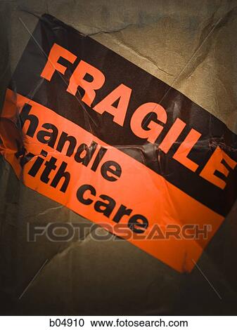 Fragile label on cardboard box View Large Photo Image Stock Image - Fragile label on cardboard box. Fotosearch
