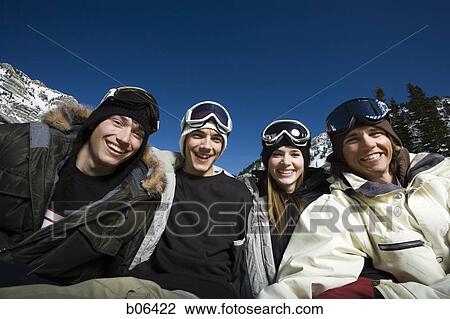 Friends outside in the snow View Large Photo Image Stock Image - Friends outside in the snow. Fotosearch