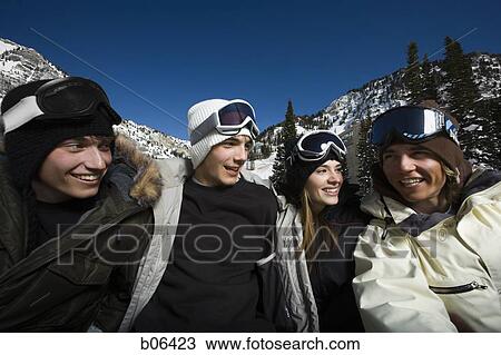 Friends outside in the snow View Large Photo Image Stock Image - Friends outside in the snow. Fotosearch