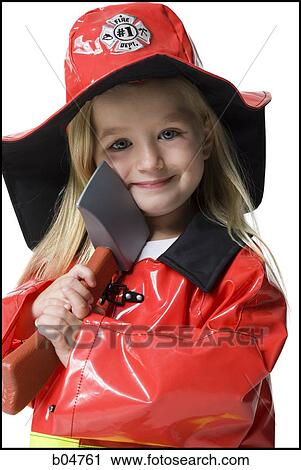 Girl in firefighter costume View Large Photo Image Stock Image - Girl in firefighter costume. Fotosearch