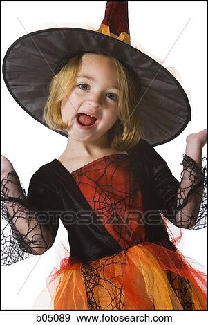 Girl in witch costume View Large Photo Image Stock Photo - Girl in witch costume. Fotosearch