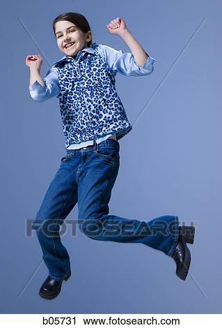 Stock Image - Girl jumping. Fotosearch