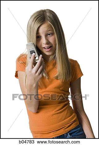 Stock Image - Girl looking at cell phone. Fotosearch