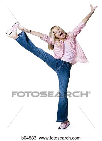 Stock Image - Girl making funny face and stretching. Fotosearch