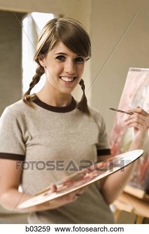 Stock Photo - Girl painting. Fotosearch