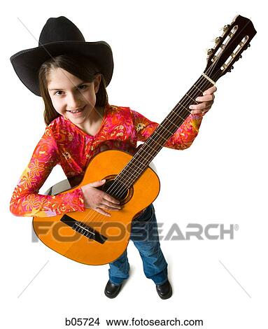 Girl playing the guitar View Large Photo Image Picture - Girl playing the guitar. Fotosearch