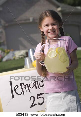 Girl selling lemonade View Large Photo Image Stock Image - Girl selling lemonade. Fotosearch