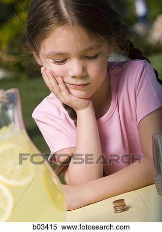 Stock Photography - Girl selling lemonade. Fotosearch