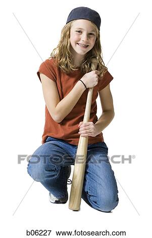 Stock Photo - Girl with a baseball bat. Fotosearch