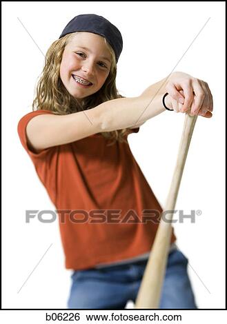 Stock Photograph - Girl with a baseball bat. Fotosearch