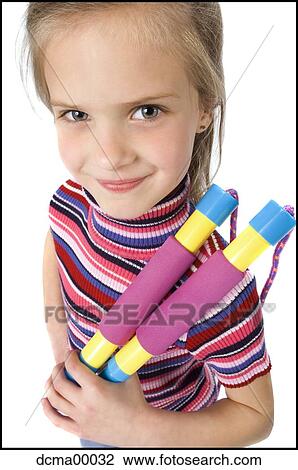 Stock Image - Girl with a skipping rope. Fotosearch