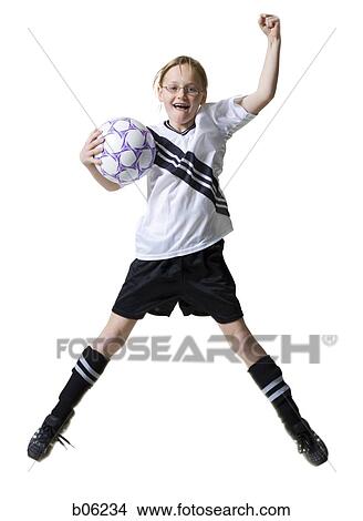 Girl with a soccer ball View Large Photo Image Picture - Girl with a soccer ball. Fotosearch