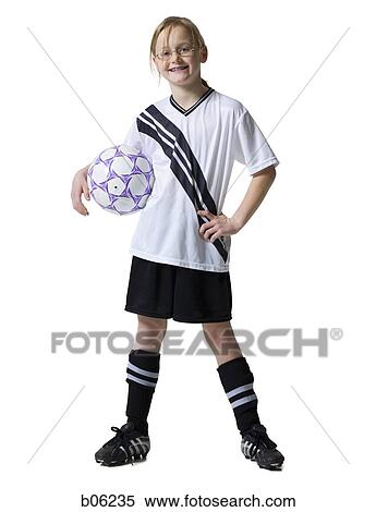 Stock Photography - Girl with a soccer ball. Fotosearch