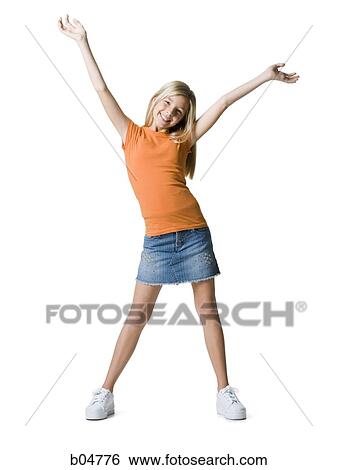 Stock Photograph - Girl with arms up smiling. Fotosearch