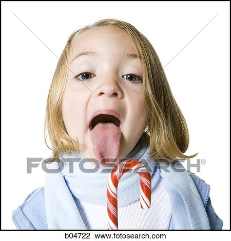 Stock Image - Girl with candy cane. Fotosearch