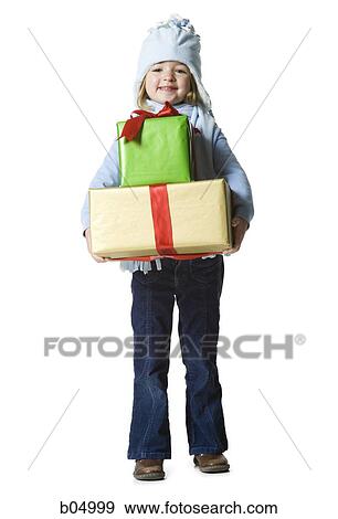 Girl with Christmas gifts View Large Photo Image Stock Photo - Girl with Christmas gifts. Fotosearch