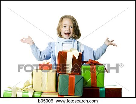 Girl with Christmas gifts View Large Photo Image Stock Photograph - Girl with Christmas gifts. Fotosearch