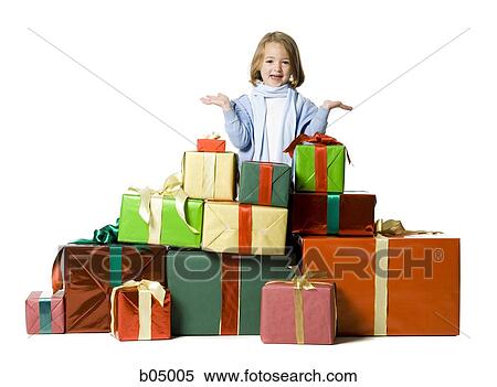 Stock Photography - Girl with Christmas gifts. Fotosearch
