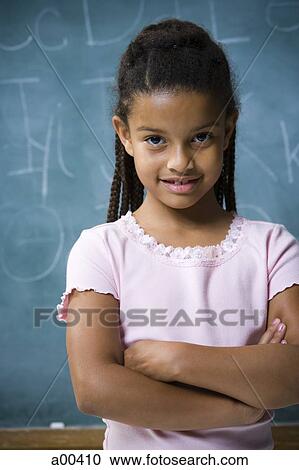 Stock Image - Girl with crossed arms. Fotosearch