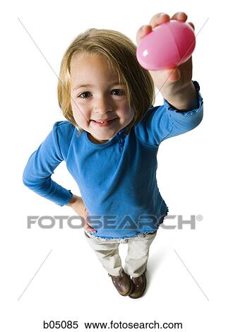 Girl with easter egg View Large Photo Image Stock Photography - Girl with easter egg. Fotosearch