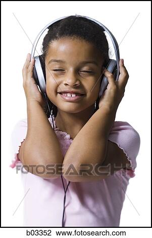 Girl with headphones View Large Photo Image Stock Image - Girl with headphones. Fotosearch