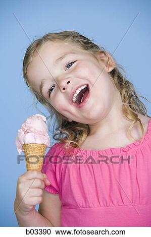 Girl with ice cream cone View Large Photo Image Stock Image - Girl with ice cream cone. Fotosearch