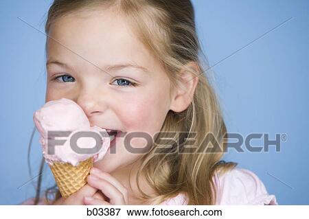 Girl with ice cream cone View Large Photo Image Stock Photo - Girl with ice cream cone. Fotosearch