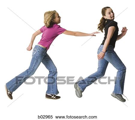 Girls playing tag View Large Photo Image Stock Photography - Girls playing tag. Fotosearch
