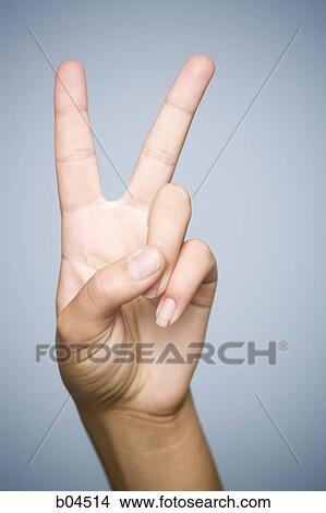 Hand peace symbol View Large Photo Image Picture - Hand peace symbol. Fotosearch
