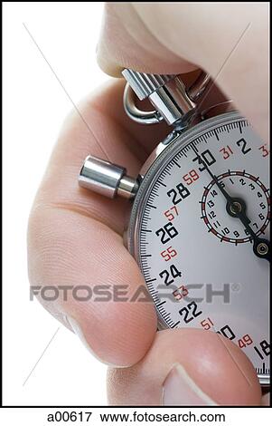 Hand with stopwatch View Large Photo Image Stock Photo - Hand with stopwatch. Fotosearch