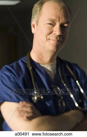 Hospital worker posing View Large Photo Image Stock Image - Hospital worker posing. Fotosearch