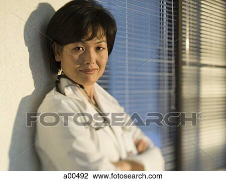 Hospital worker posing View Large Photo Image Stock Image - Hospital worker posing. Fotosearch