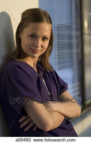 Hospital worker posing View Large Photo Image Stock Image - Hospital worker posing. Fotosearch