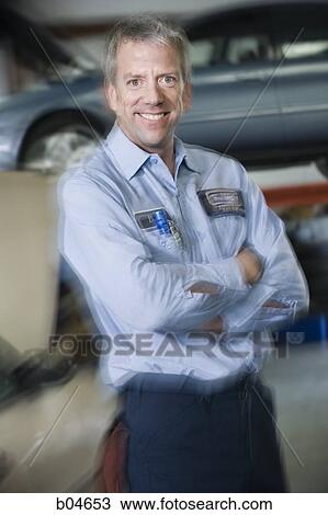 Male auto shop worker View Large Photo Image Stock Image - Male auto shop worker. Fotosearch