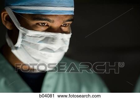 Male doctor in surgical scrubs View Large Photo Image Stock Image - Male doctor in surgical scrubs. Fotosearch
