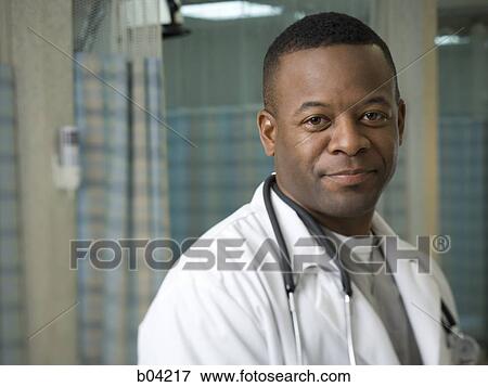 Male doctor posing View Large Photo Image Stock Photo - Male doctor posing. Fotosearch