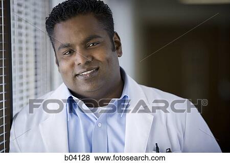 Stock Photo - Male doctor smiling. Fotosearch