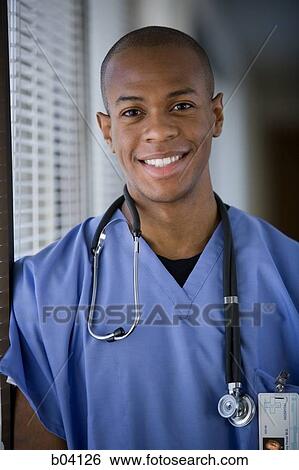 Male doctor smiling View Large Photo Image Stock Photograph - Male doctor smiling. Fotosearch