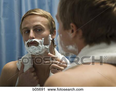 Male grooming himself View Large Photo Image Stock Image - Male grooming himself. Fotosearch