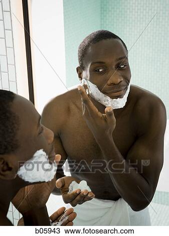 Male grooming himself View Large Photo Image Stock Image - Male grooming himself. Fotosearch