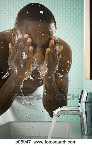 Male grooming himself View Large Photo Image Stock Photo - Male grooming himself. Fotosearch