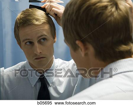Male grooming himself View Large Photo Image Stock Photography - Male grooming himself. Fotosearch