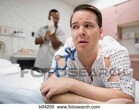 Male patient waiting for examination View Large Photo Image Stock Photography - Male patient waiting for examination. Fotosearch