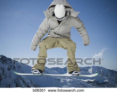Stock Image - Male snowboarder. Fotosearch