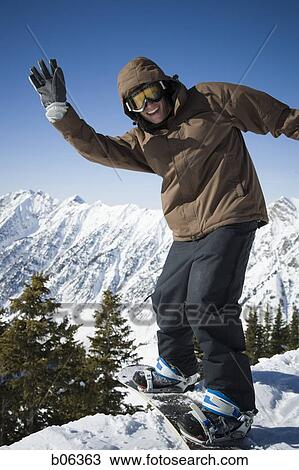Stock Image - Male snowboarder. Fotosearch