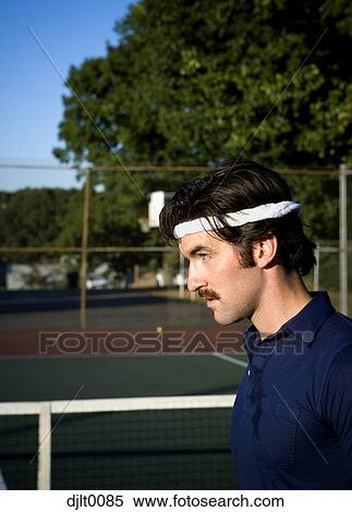 Stock Photography - Male Tennis Player on the court. Fotosearch
