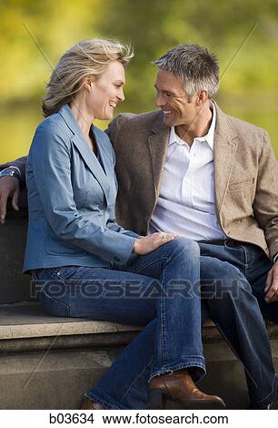 Man and woman smiling View Large Photo Image Picture - Man and woman smiling. Fotosearch