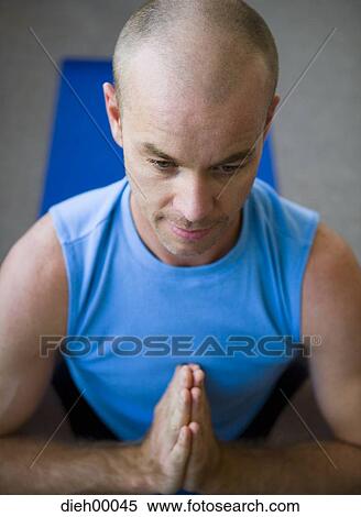 Man doing yoga View Large Photo Image Stock Photography - Man doing yoga. Fotosearch