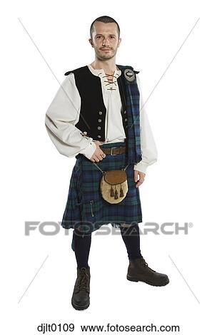 Man dressed in kilt View Large Photo Image Stock Photo - Man dressed in kilt. Fotosearch